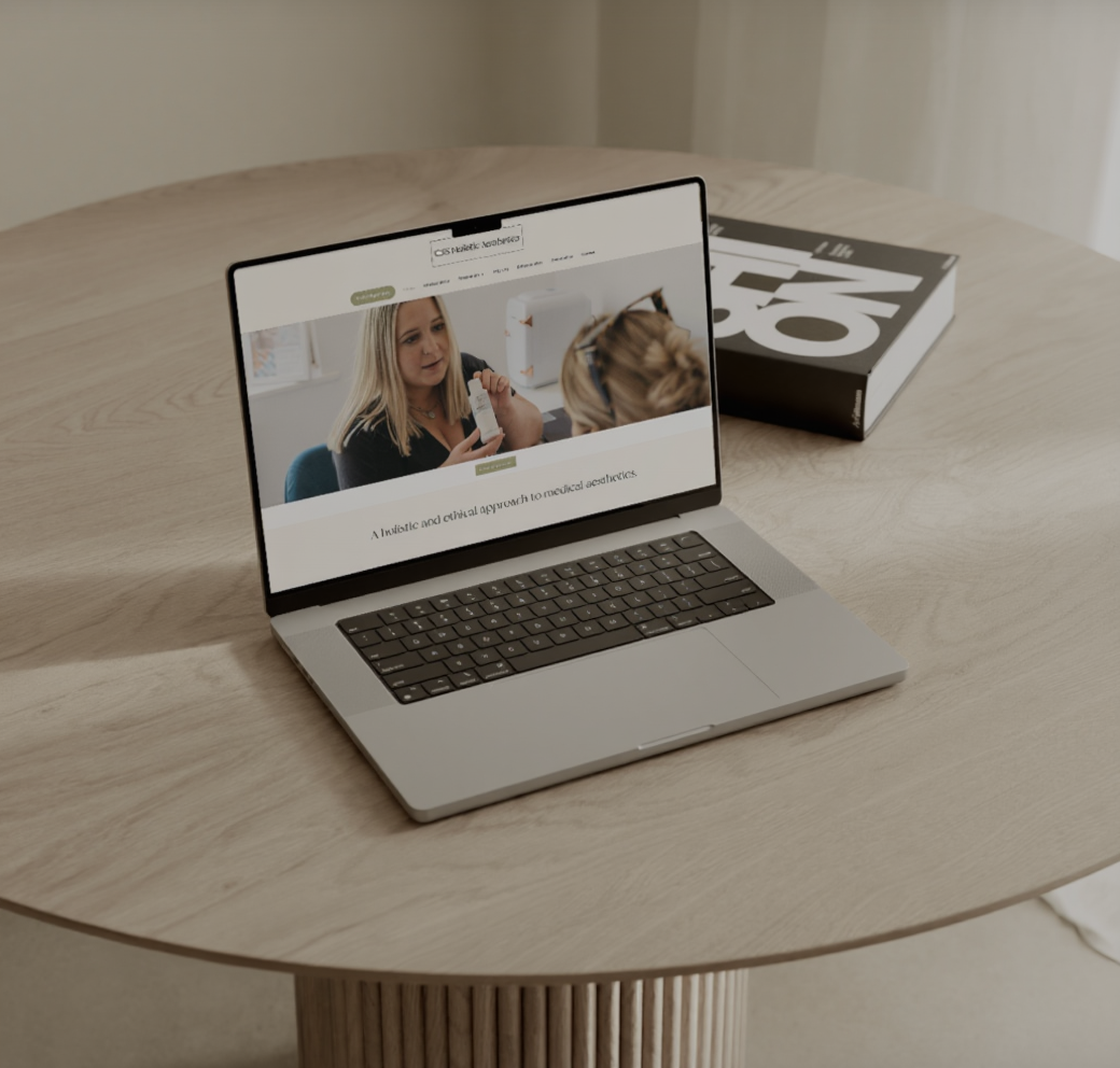 Picture of a labtop showing an image on a desk